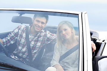 Image showing Couple, portrait and convertible or road trip outdoor for vacation or travel destination, adventure or holiday. Man, woman and transportation in London weekend for relax journey, drive or tourist