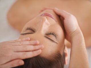 Image showing Hands, face and massage woman at spa to relax, wellness and calm at luxury resort for acupressure therapy with masseuse. Closeup, head and person at salon for facial treatment, skincare and beauty