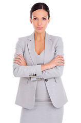 Image showing Portrait, serious and business woman with arms crossed in studio isolated on a white background. Confidence, professional agent or entrepreneur with pride for career, job or employee working in Spain