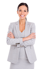 Image showing Portrait, smile and business woman with confidence in studio isolated on a white background. Arms crossed, professional and face of advisor, entrepreneur and employee with pride for career in Spain