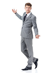 Image showing Studio, portrait and businessman presenting offer with mockup for vote, choice or decision. Announcement, opportunity or promotion with professional man showing business space on white background.