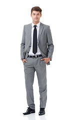 Image showing Studio, portrait or young businessman with ambition in career or professional attorney by white background. Lawyer, positive or face with pride for law job, mock up or hands in pocket of fashion suit