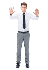 Image showing Portrait, business and man with hands up, stop and employee isolated on white studio background. Person, mockup space and professional with hand gesture and warning with rejection, deny ir consultant