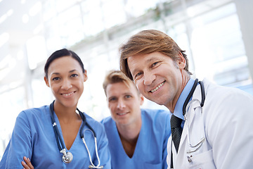 Image showing Teamwork, happy and portrait of doctors in hospital for medical service, insurance and support. Professional nurses, healthcare and men and women for collaboration, consulting and medicine in clinic