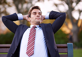 Image showing Businessman, bench and relax in park for morning, idea or fresh air at sunrise in New York. Corporate, man and formal clothes with confidence for vision, break or thinking outdoors in nature