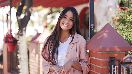 Image showing Young Woman Enjoying Sunny Day in Spanish Town