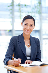 Image showing Portrait, smile and woman with a notebook, writing and planning with a PR consultant or confidence. Face, person and employee with idea, schedule or calendar for startup or decision with productivity