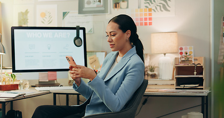 Image showing Phone, happy and businesswoman in the office typing a text message on social media or the internet. Smile, technology and professional female creative designer scroll on cellphone in the workplace.