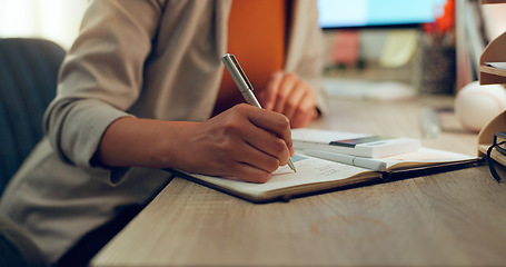 Image showing Accounting, hand and calculator or writing in a notebook for finance budget, cost or tax math. Closeup of an accountant woman at desk with notes for calculation, bookkeeping or investment in business