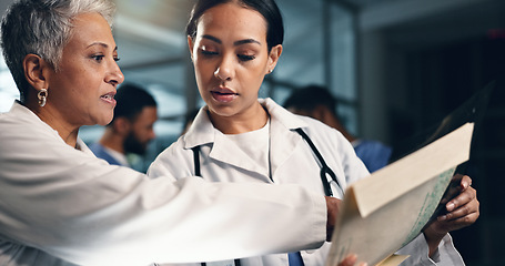 Image showing Doctor, women together and tablet in night, documents or analysis for results, decision or info in hospital. Mature medic, partnership and paperwork for healthcare, wellness and planning with choice