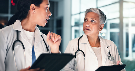 Image showing Doctors night planning and tablet with talking, medical data and research in a hospital with women. Working, online and diagnosis discussion for healthcare, wellness and clinic job with conversation