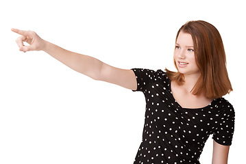 Image showing White background, portrait and girl to point, wonder and contemplate with mockup in studio. Confident, gen z teenager or female student with finger, eyes and smile to imagine, announce and show ideas