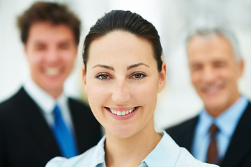 Image showing Business woman, smile in portrait and leadership at law firm, pride and ambition with attorney team. Corporate lawyer, happy with career for justice and supervisor in professional headshot at office