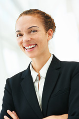 Image showing Happy, woman and arms crossed in office with professional accountant working in financial company with pride. Person, smile and confidence in corporate accounting firm as business advisory in economy