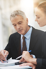 Image showing Boss, planning and talking to employee in office for strategy with notebook and brainstorming. Woman, conversation and collaboration with CEO of corporate company for business with discussion