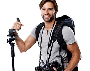 Image showing Portrait, man and backpack with photography equipment for photoshoot in studio on white background. Professional photographer, confidence and bag with cameras, tripod and big smile for mockup