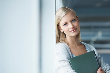 Image showing University, college and portrait of woman with books in hallway for learning, studying and knowledge. Academy, mockup and happy student with textbooks for scholarship, notes or education on campus