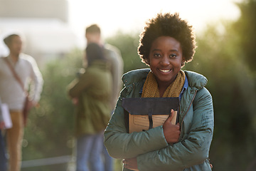 Image showing Black woman, university student and portrait with book on campus for prepare, information and notes on research. Outdoor, college and knowledge with advice for test and assignment submission.