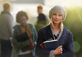 Image showing Student, woman and portrait with books outdoor, education and learning material in winter for studying. School, scholarship and university for academic growth, textbook or notebook with knowledge