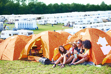 Image showing Happy friends, tent or laughing at funny festival for joke, comedy or humor at outdoor campsite. Friendship, young group or people enjoying fun holiday weekend, event or camping out on grass at party