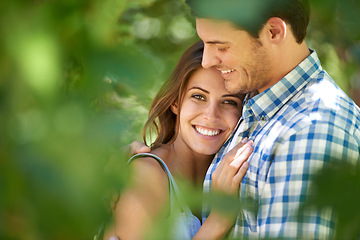Image showing Portrait view, of a happy young couple hug, nature out in the park and bonding outdoors. Love, relationship and travel with romantic partners, getaway date for holiday summer and laughing in Rome