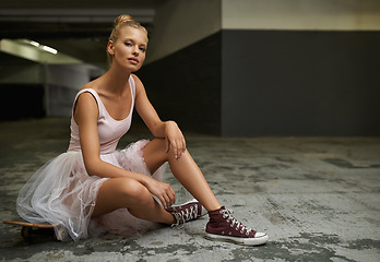 Image showing Ballet, fashion and portrait of woman with skateboard for edgy outfit, trendy sneakers and hipster style. Parking lot, modern aesthetic and ballerina on floor for dance hobby, sports or skating skill
