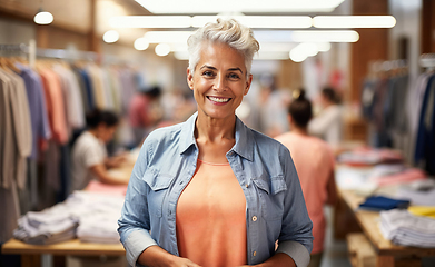 Image showing Senior Woman Shopping in Clothing Store