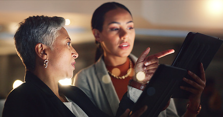 Image showing Mentor, training and employee working on a night project with manager helping with computer or online strategy. Corporate, talking and business women planning together for company development