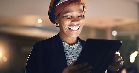 Image showing Business, happy black woman and tablet at night in office to search online report, scroll information and website planning. Corporate employee working late on digital data, tech or social network app