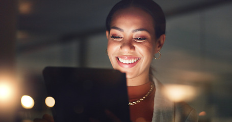 Image showing Business woman, smile and tablet at night in office to search online report, scroll information and website planning. Happy corporate employee working late on digital data, tech or social network app