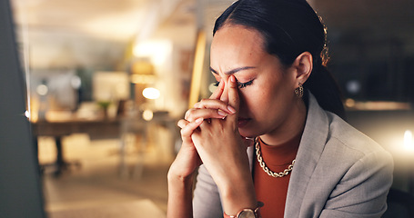 Image showing Night, headache and business woman with stress working on computer in corporate company office with burnout. Overworked, frustrated and employee tired due to mistake, risk or fail on overtime project