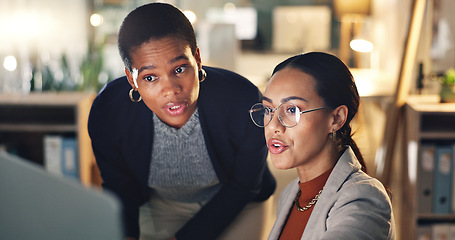 Image showing Computer, discussion and business people in office at night working on a legal case with deadline. Explain, technology and professional women corporate lawyers doing research on desktop in workplace.