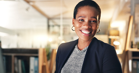 Image showing Face, happy and black woman in office at night for business on a computer during overtime. Smile, workspace and portrait of an African employee with a pc for a late deadline or working in corporate