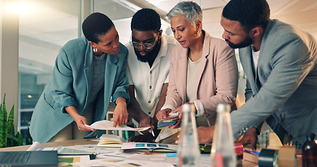 Image showing Meeting, planning and business people in the office at night for a creative project with color samples. Professional, diversity and team of designers working overtime in collaboration for deadline.