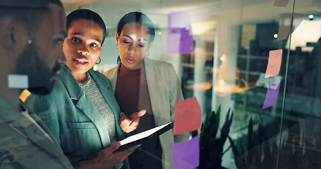 Image showing Business woman, presentation and notes on board in an office for training, meeting or ideas. Men and women talking about strategy, planning or pitch with technology, leader and a team at night