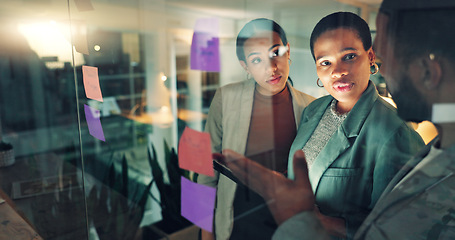 Image showing Business woman, tablet and notes on board in an office for training, meeting or ideas. Men and women talking about strategy, planning or scrum for pitch with technology, leader and a team at night