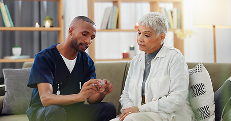 Image showing Caregiver, patient and pills, instructions and help for treatment dosage, medicine and elderly care. Pharmaceutical drugs, advice and African nurse with old woman on sofa and supplements for health