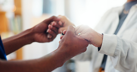 Image showing Homecare, holding hands or empathy by caregiver for senior woman in a house with kindness, comfort or support closeup. Hope, recovery or nurse and old person with understanding, trust or compassion