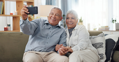 Image showing Senior couple, selfie and sofa with love, social media and happy together in a home. Retirement, marriage and profile picture with elderly people in a house on a website online with support and trust