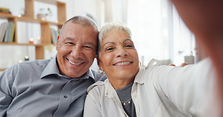 Image showing Senior couple, selfie and living room at home with smile, love and care together on a sofa. Social media, happy and face in a lounge with support and laughing in retirement with marriage on a couch