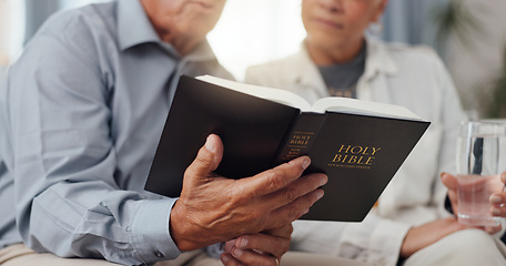 Image showing Couple, hands and home for reading bible, talking of faith and God with helping, support and scripture on sofa. Mature people or pastor in living room with holy book for religion and Christianity