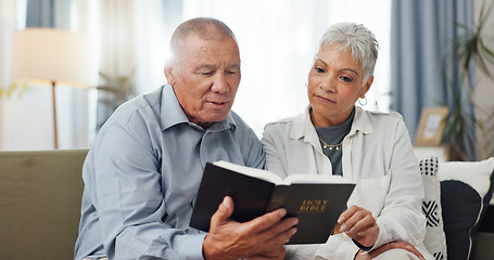 Image showing Senior, couple and home reading bible and talking of faith, god or helping with spiritual guide of scripture on sofa. Elderly man, pastor and christian woman with holy book for religion and support