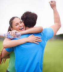 Image showing Hug, outdoor and couple with exercise, celebration and workout goals with progress and achievement. Break, embrace or woman with man or excited with wellness or healthy with support, smile or fitness