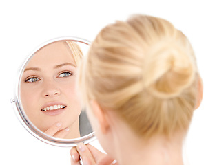 Image showing Face, reflection and woman with beauty for natural skincare and wellness on white background. Mirror, vanity and admiring clean skin with healthy glow, facial treatment and hygiene with smile