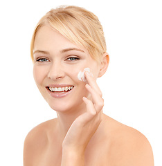 Image showing Skincare, face cream and portrait of woman in studio with natural, health and beauty routine. Glow, smile and model with facial spf, sunscreen or lotion for dermatology treatment by white background.