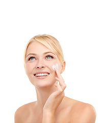 Image showing Beauty, thinking and woman with face cream in studio with natural, health and skincare routine. Glow, smile and model with spf, sunscreen or lotion for dermatology treatment by white background.