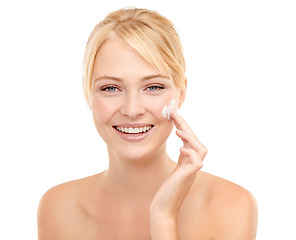 Image showing Beauty, face cream and portrait of woman in studio with natural, health and skincare routine. Glow, smile and model with facial spf, sunscreen or lotion for dermatology treatment by white background.