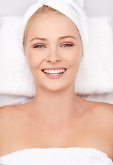 Image showing Spa, portrait and happy woman relax in a bed for hair, beauty or scalp massage at resort from above. Luxury, face and female client smile with body, treatment or head steam cleanse at wellness salon