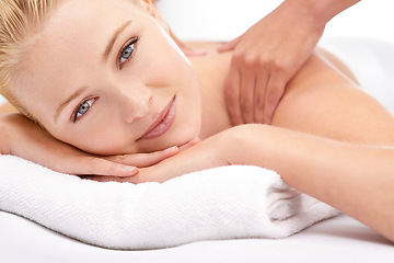 Image showing Woman, portrait and body massage at spa with hands for treatment, skincare and wellness in studio. Face of a happy client or model relax on table with therapist for shoulder, muscle or stress relief