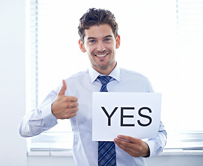 Image showing Businessman, portrait and happy with poster or thumbs up for yes, we are hiring and recruitment support in office. Human resource, employee and face with smile, billboard paper and placard with offer